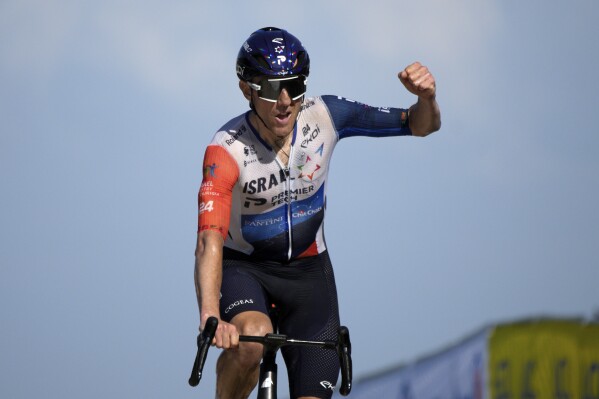 Woods secures big win at top of famed Tour de France mountain as